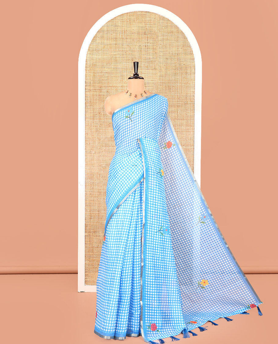 Blue Linen Cotton Saree, Decorated with Micro-Checks and Floral Motifs on Its Body, Subtle Piping Border, a Self-Pallu, and Paired with a Rose Floral Printed Blouse