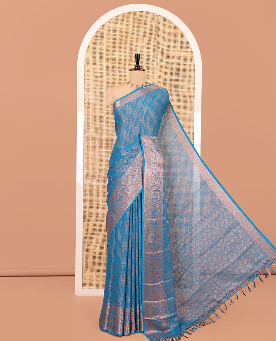Blue Chiffon Saree, Richly Elevated with Ikat-Style Weave and Stonework, a Traditional Border, a Floral Design Pallu, and a Matching Blouse