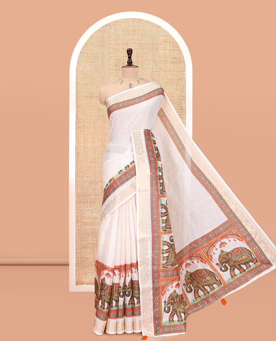 Cream Semi-Tussar Saree Features Checks and Elephant Print, a Paisley Zari Border, and a Contrast Blouse