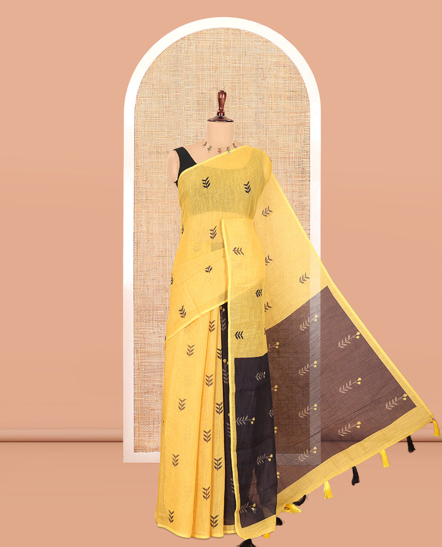 Borderless Yellow Linen Cotton Saree, Adorned with Leaf Print, a Contrast Leaf-Printed Pallu, and Contrast Blouse