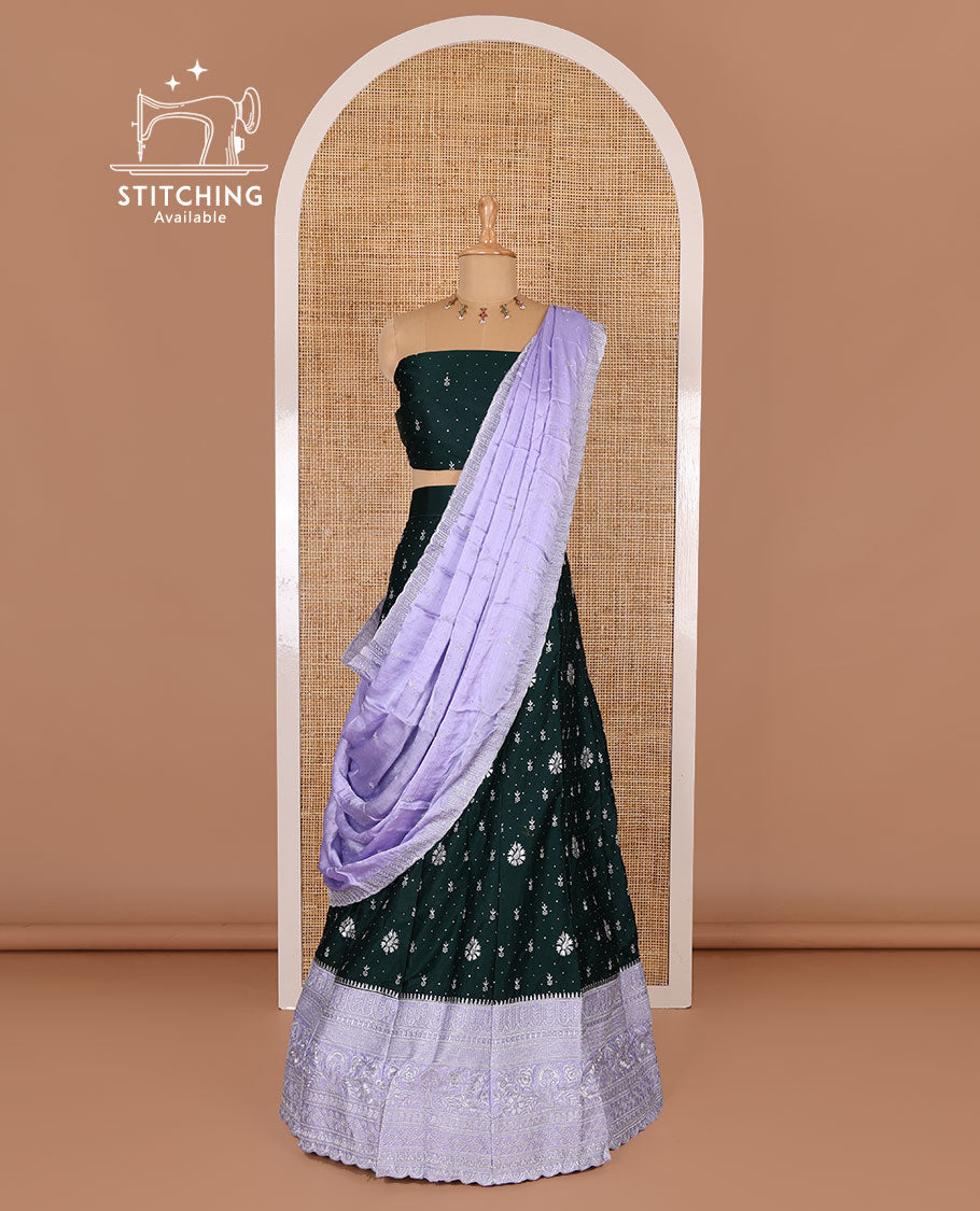 Dark Green half-saree, floral motifs embroidered semi raw silk top, matching embroidered blouse, and contrast scallop embroidered georgette dhavani