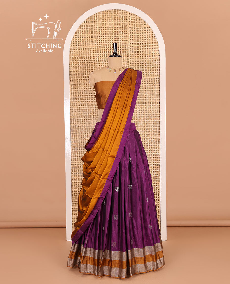 Purple and mustard half-saree, peacock butta with contrast bordered taffeta silk skirt, a plain blouse, and a contrast bordered syska georgette dhavani