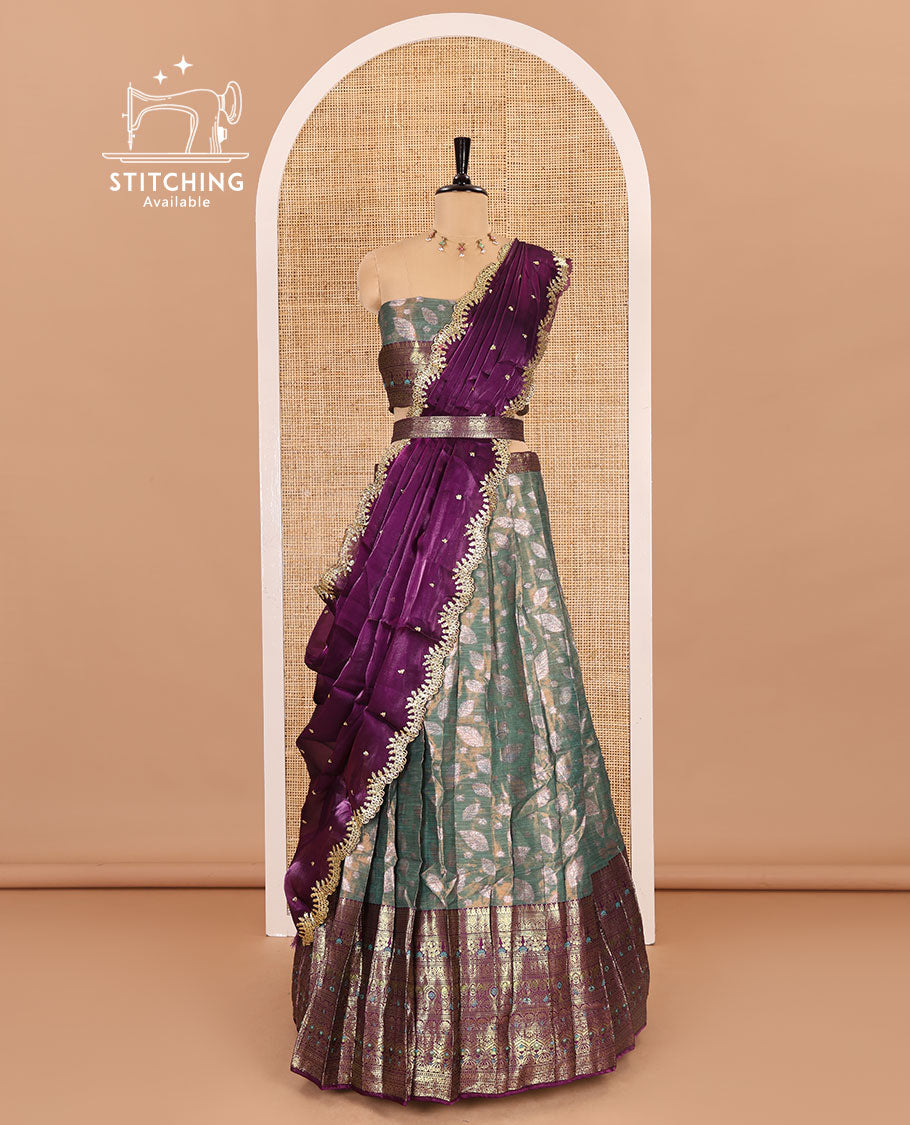 Green and wine half-saree, leaf jacquard with contrast traditional bordered banarasi tissue skirt, a matching blouse, and a contrast scallop embroidered fendi organza dhavani