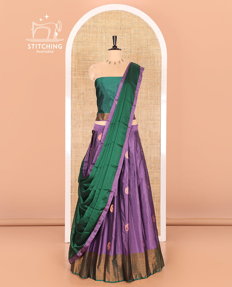 Lavender and green half-saree with paisley buttas with contrast traditional bordered taffeta silk skirt, a matching blouse, and a contrast bordered syska georgette dhavani
