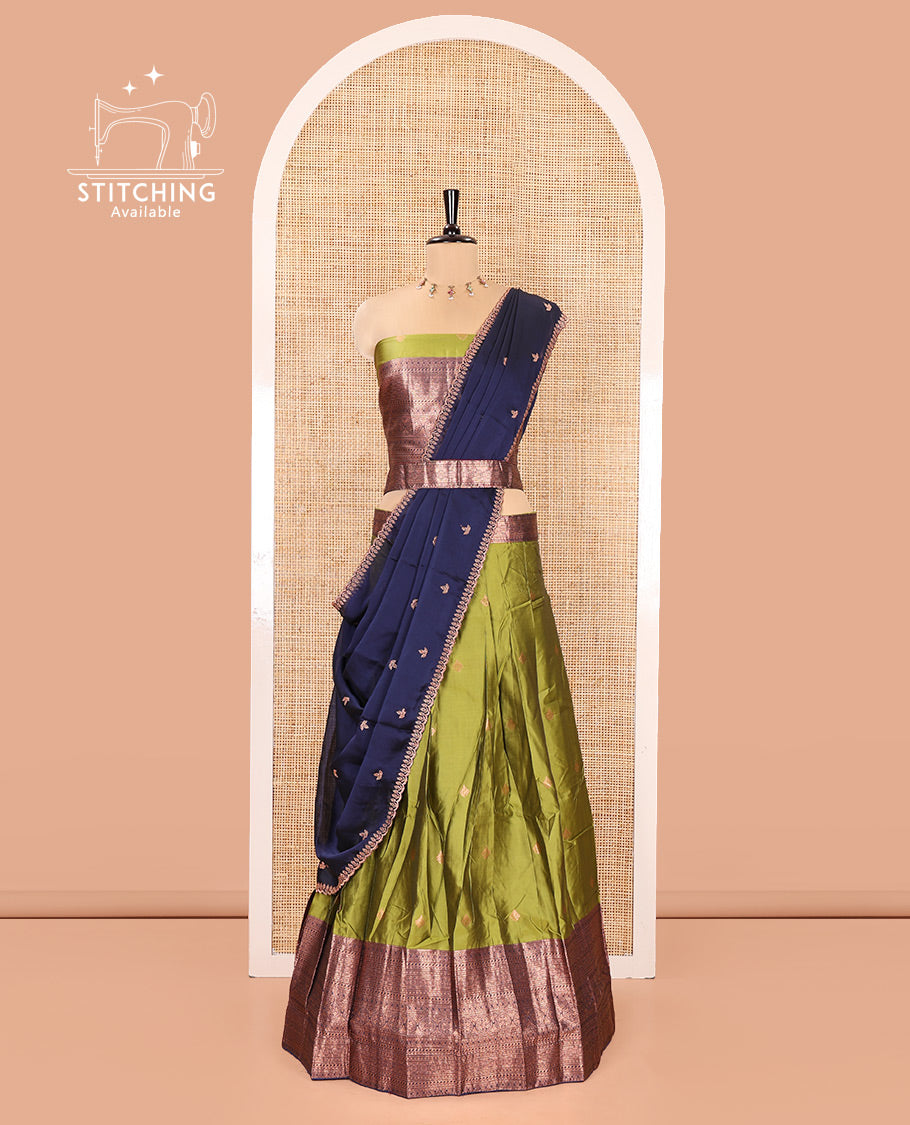 Green and Navy Blue Semi-Banarasi Half-Saree, Ornamented with Zari Buttas on Its Skirt, Complemented by a Contrast Traditional Zari Designs Woven Border, Paired with a Matching Blouse, and a Contrast Satin Georgette Embroidered Scallop Dhavani