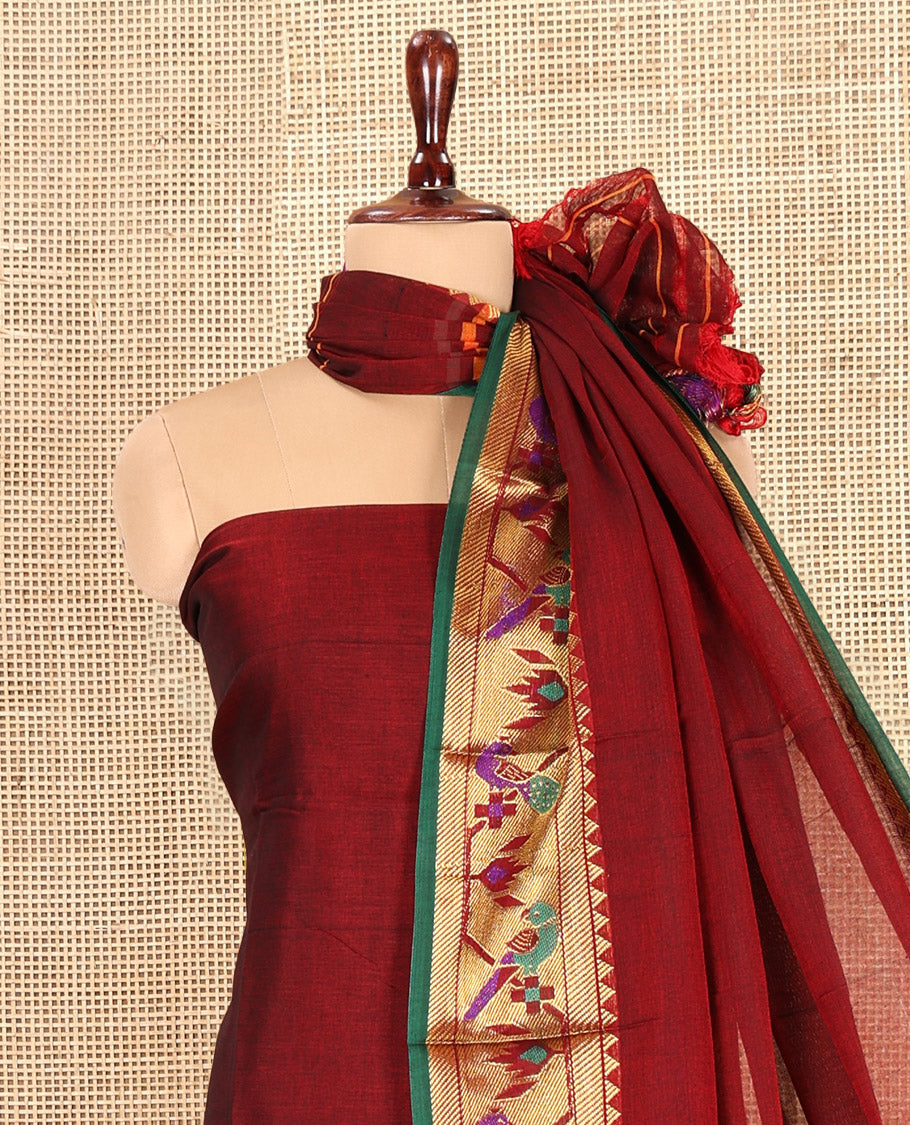 Maroon Mercerised Cotton Material Chudidar Features Plain Top, Contrast Paithani Zari Border, a Plain Bottom and a Matching Dupatta