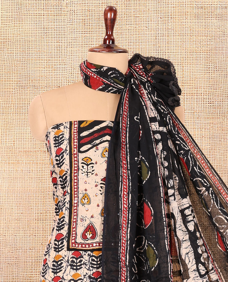 Black-Red Cotton Material Chudidar Features Batik-Printed Top, a Contrast-Printed Bottom, Batik-Printed Dupatta
