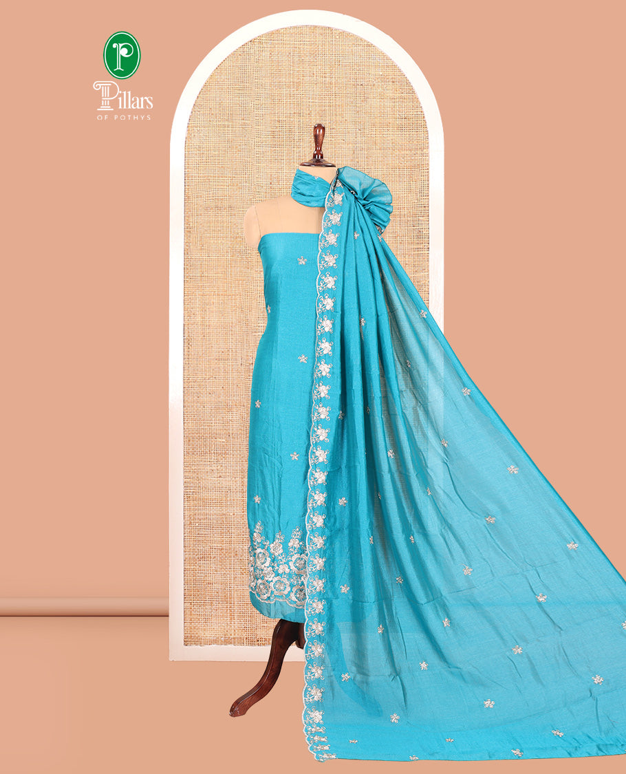 Rama Blue Semi-Silk Material Churidar Features a Floral Embroidered Top, a Matching Bottom, Embroidered Dupatta