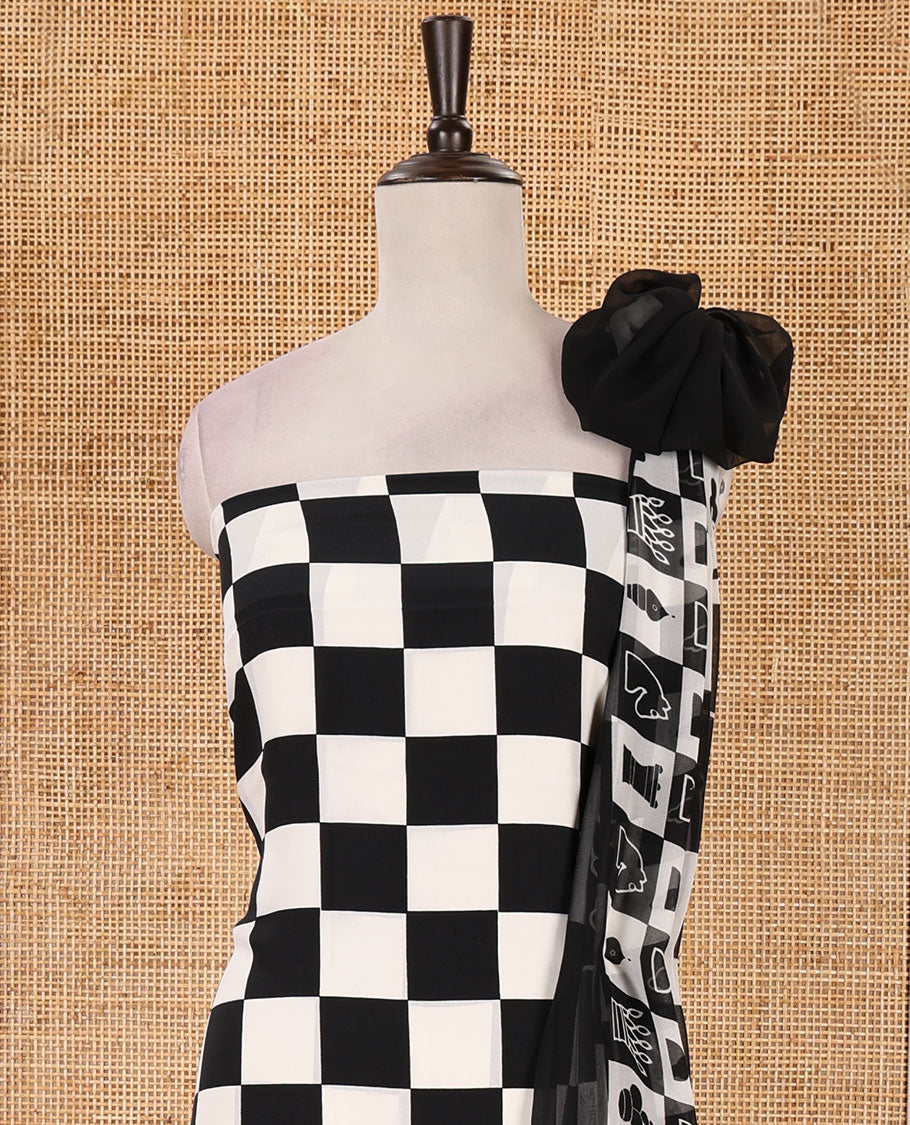 Black & white material chudidar set, chess-board & characters printed crepe top, plain santoon bottom & chess coins printed georgette dupatta