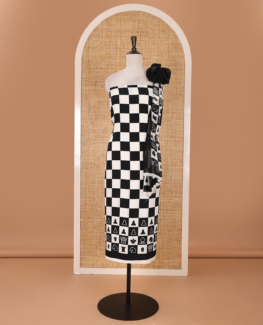 Black & white material chudidar set, chess-board & characters printed crepe top, plain santoon bottom & chess coins printed georgette dupatta