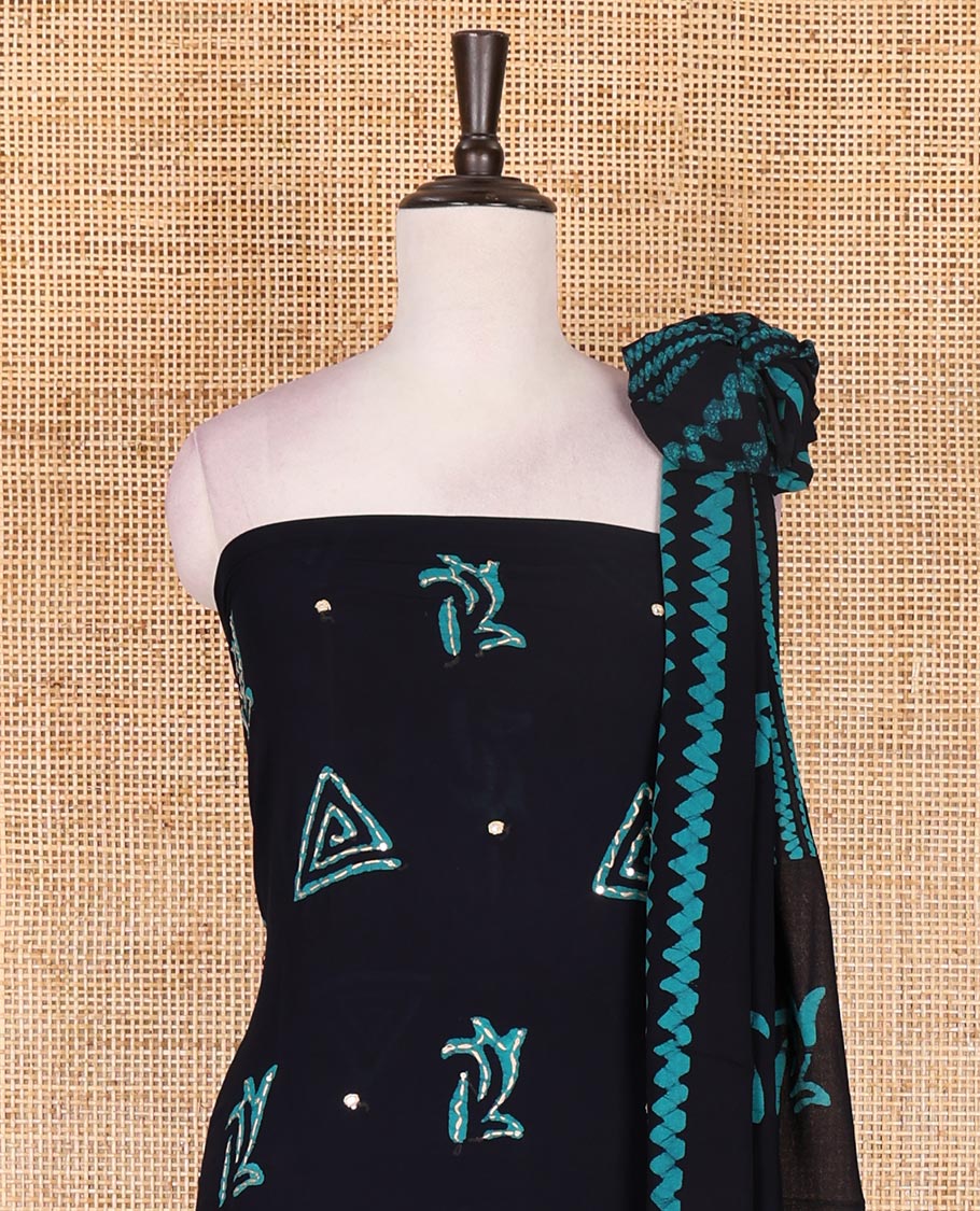 Navy blue and Rama green material chudidar set, batik print with kantha embroidered top, plain contrast bottom, and batik printed dupatta