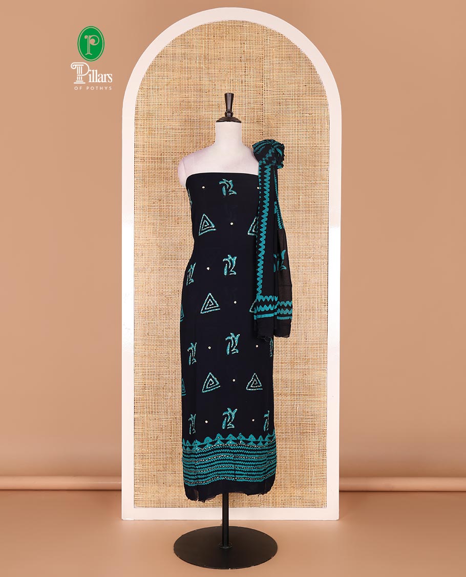 Navy blue and Rama green material chudidar set, batik print with kantha embroidered top, plain contrast bottom, and batik printed dupatta