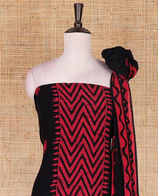 Black-rani pink material chudidar set, chevron stripes hand block printed viscose georgette top, contrast santoon bottom, and viscose georgette hand block printed dupatta