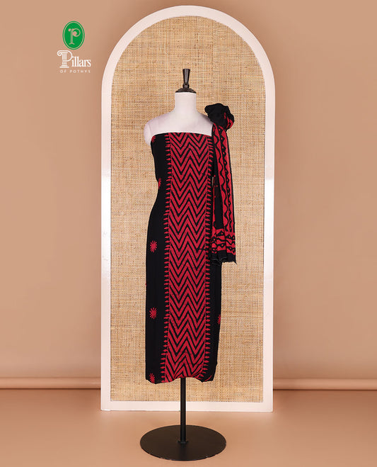 Black-rani pink material chudidar set, chevron stripes hand block printed viscose georgette top, contrast santoon bottom, and viscose georgette hand block printed dupatta