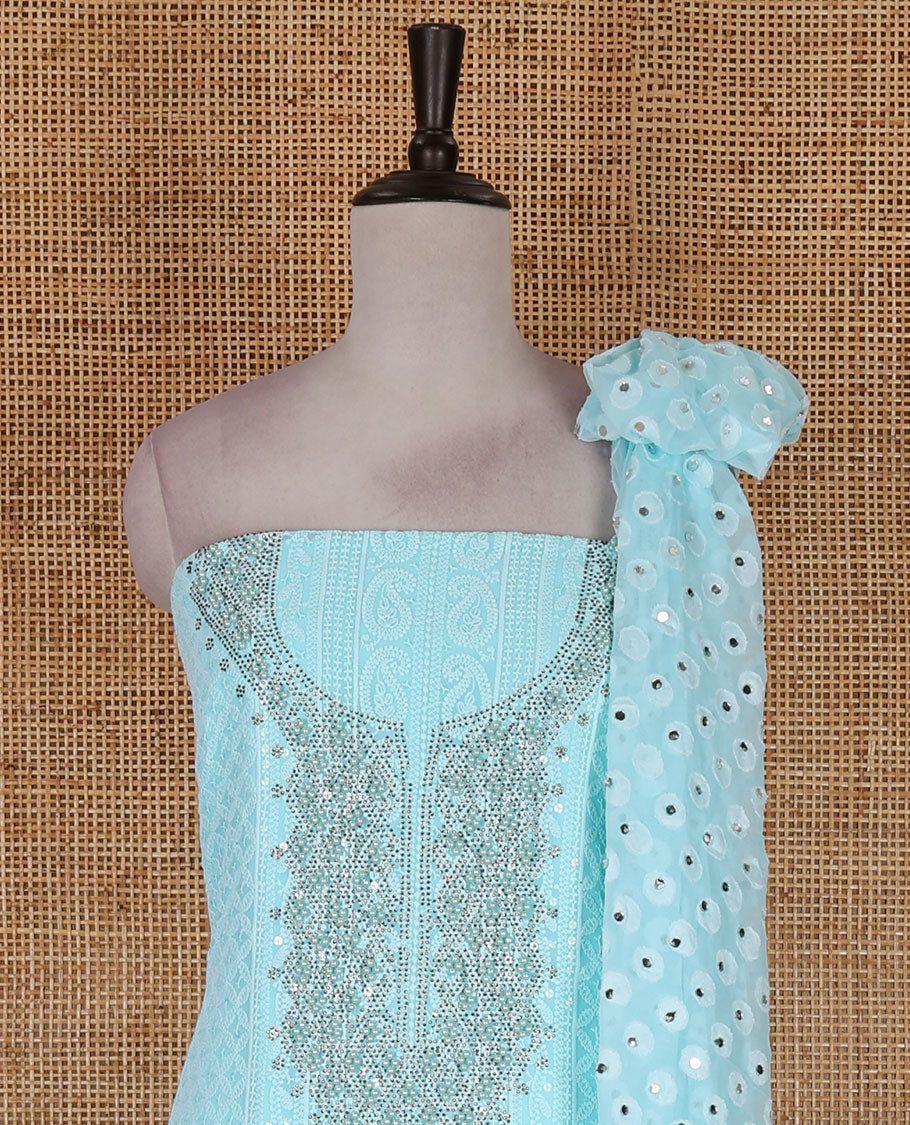 Blue material churidar set, stone work with Schiffli style embroidered georgette top, American Crape bottom, and polka dotted printed mirror work dupatta