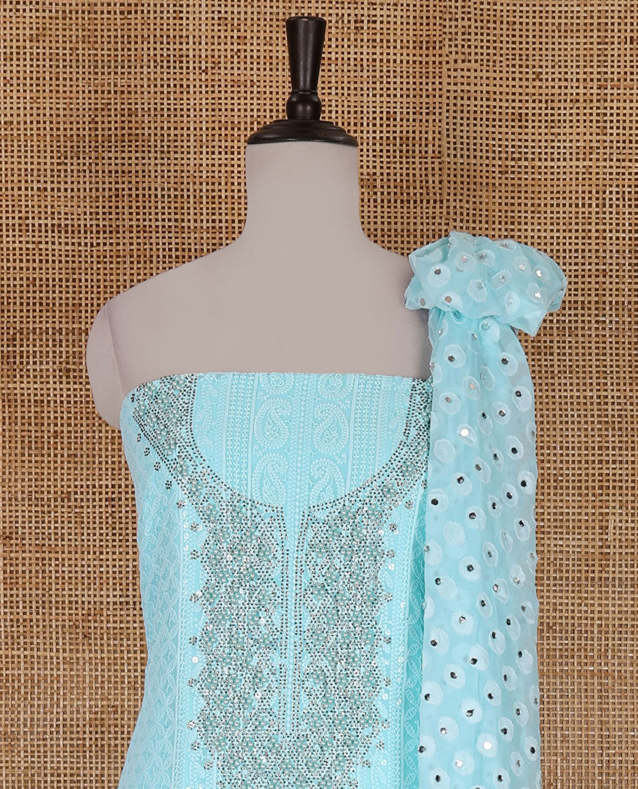 Blue material churidar set, stone work with Schiffli style embroidered georgette top, American Crape bottom, and polka dotted printed mirror work dupatta