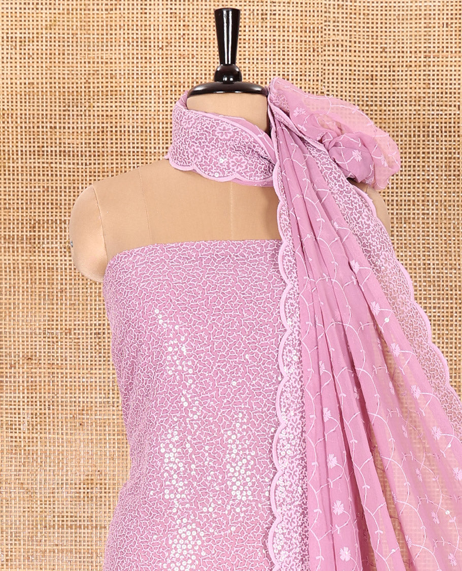 Lavender Material Chudidar Set Features Sequin Embroidered Georgette Top, a Plain American Crepe Bottom, and a Scallop Dupatta Embellished with Floral Vine Embroidery