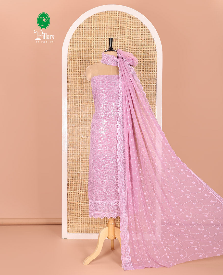 Lavender Material Chudidar Set Features Sequin Embroidered Georgette Top, a Plain American Crepe Bottom, and a Scallop Dupatta Embellished with Floral Vine Embroidery