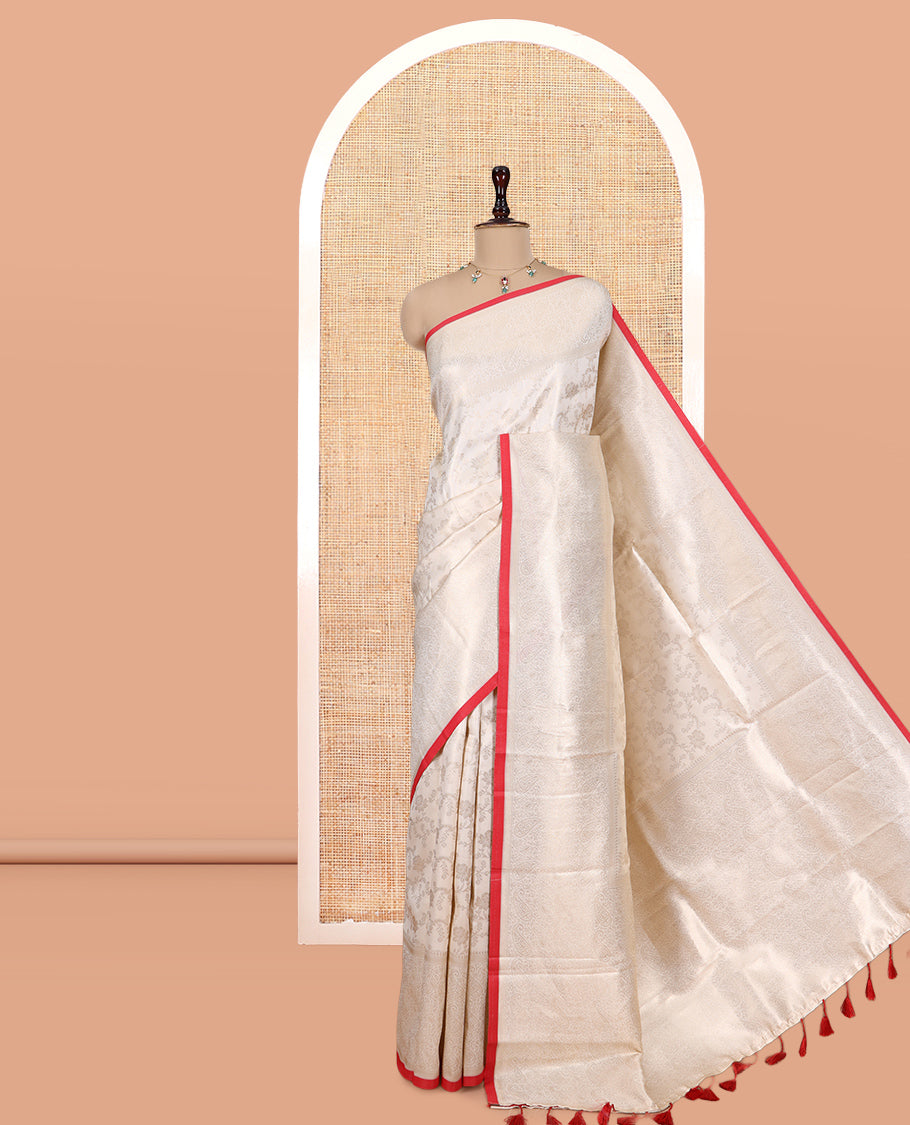Off-White-Red Semi-Silk Saree, Adorned with Floral Jacquard Design, a Zari Paisley Border, and a Contrast Blouse