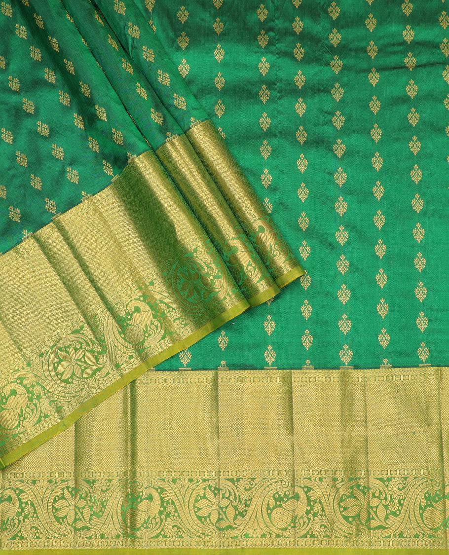Green floral buttas silk half saree with contrast thilakam mokku, paun design border, zari design blouse & zari design border dhavani