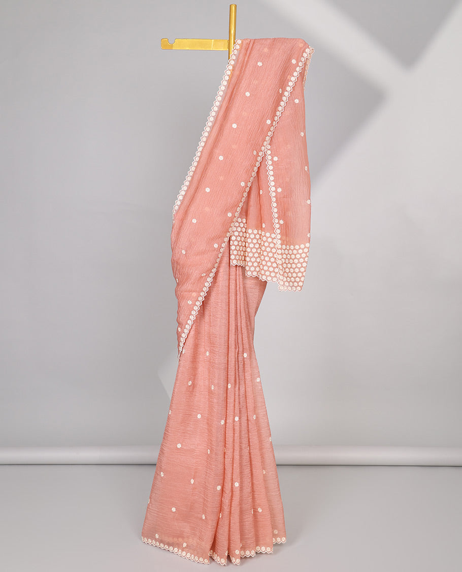 Pink Crushed Tissue saree with scallop motif border and intricate motif embroidery pallu