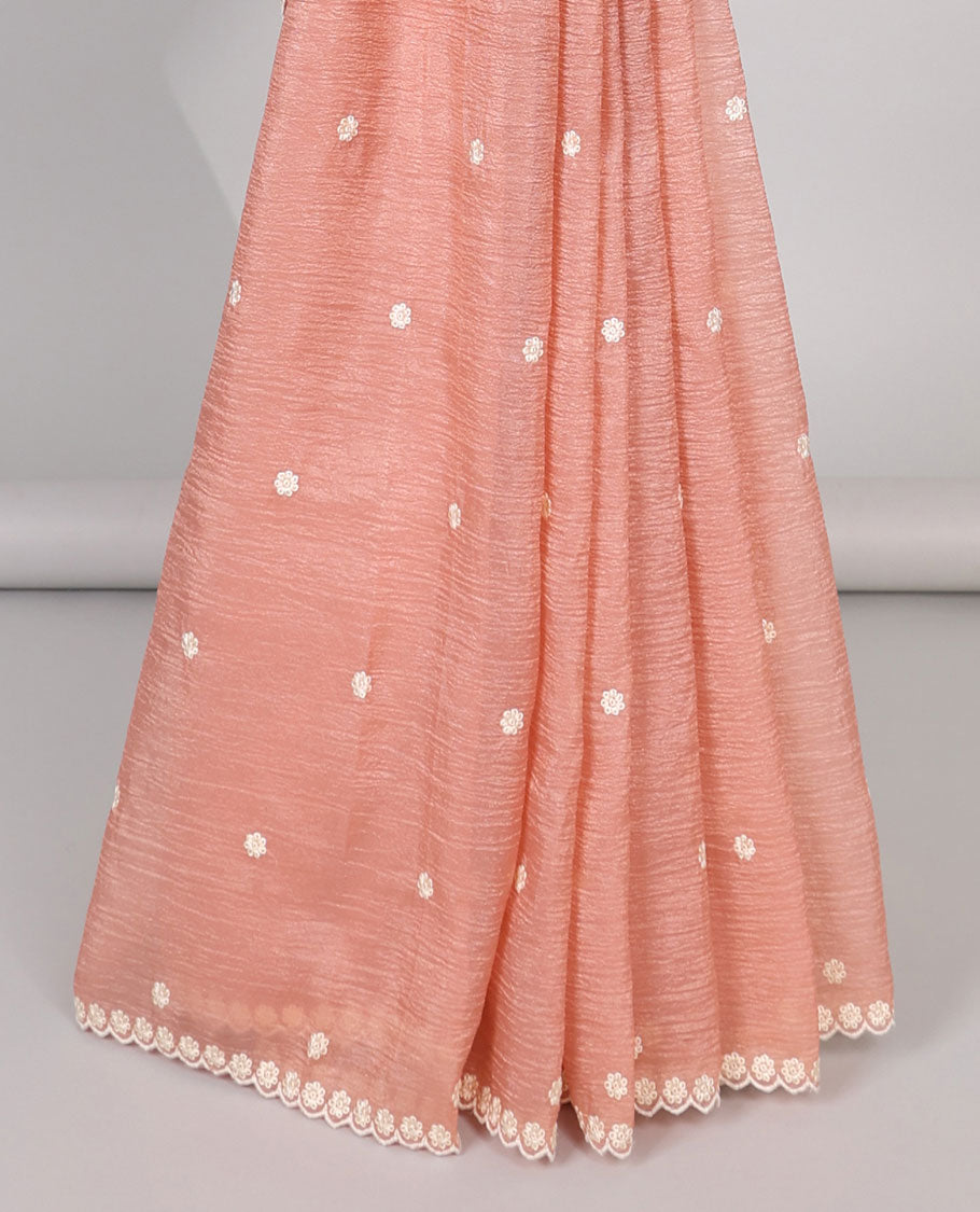 Pink Crushed Tissue saree with scallop motif border and intricate motif embroidery pallu