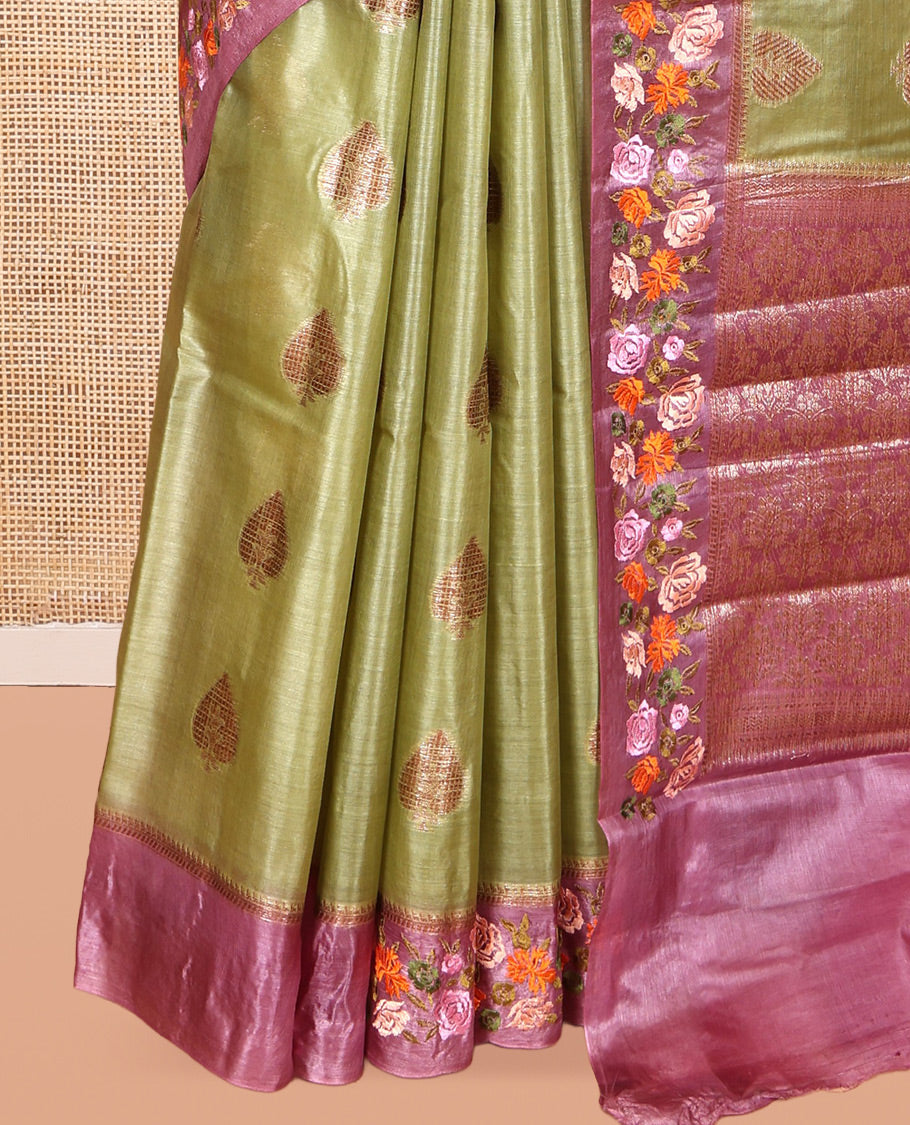 Green Tusser Silk Saree, Adorned with Buttas, a Contrast Floral Embroidered Border, Grand Pallu, and a Contrast Blouse