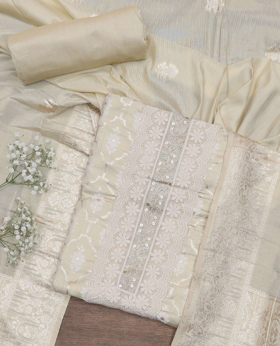Cream material chudidar set, floral butta enclosed Mughal arches foil print with neck embroidered top, plain bottom, and zari design dupatta