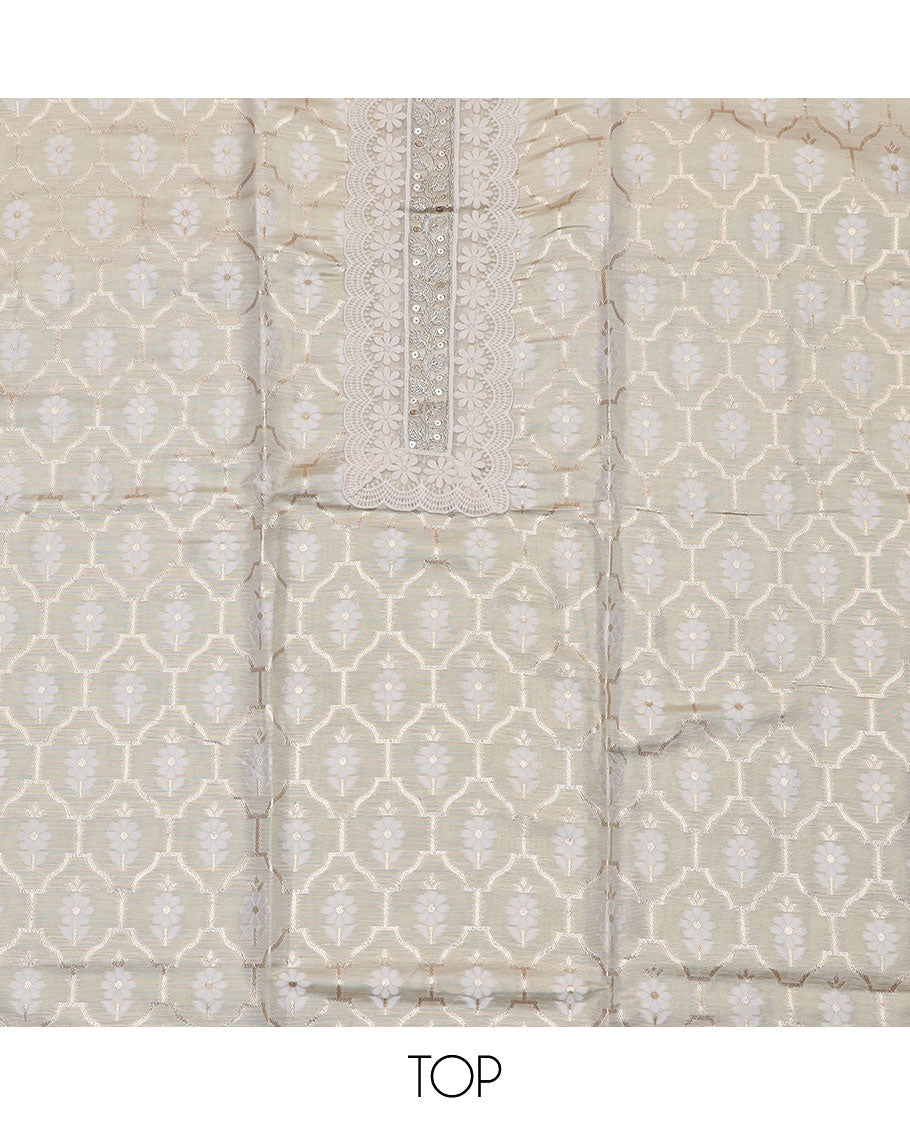 Cream material chudidar set, floral butta enclosed Mughal arches foil print with neck embroidered top, plain bottom, and zari design dupatta