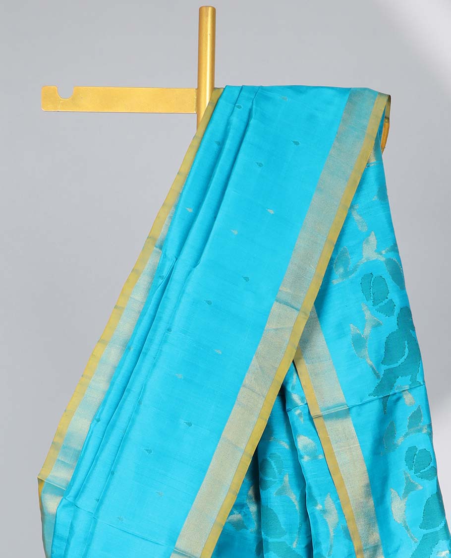 Blue motifs uppada silk saree with contrast zari border & floral design pallu