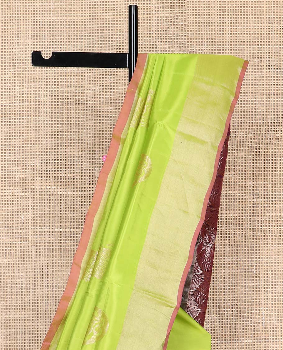 Light green motifs uppada silk saree with self zari border & floral design pallu