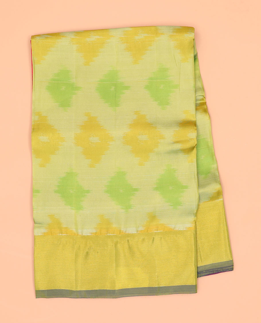 Yellow ikkat motifs semi-uppada saree with contrast zari border & ogge design enclosed with floral design pallu