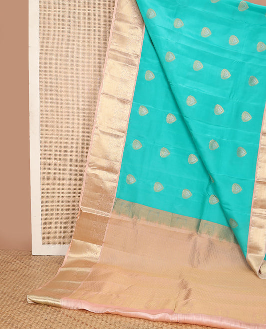 Light blue buttas vasundhara elite silk saree with contrast zari design border & floral jaal design pallu