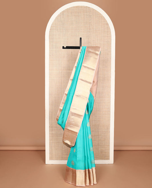 Light blue buttas vasundhara elite silk saree with contrast zari design border & floral jaal design pallu