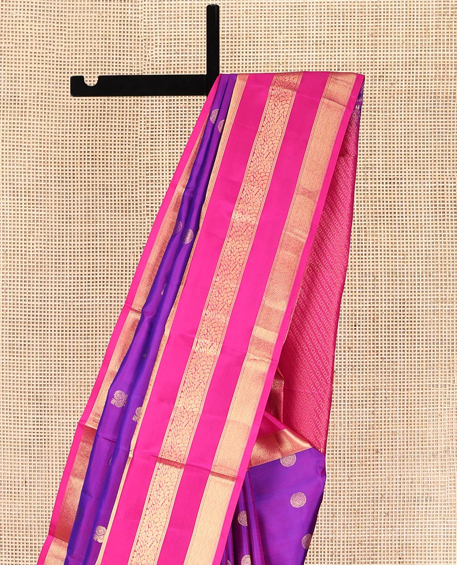 Purple Vasundhara Silk Saree, Adorned with Mayil and Chakram Buttas, Complemented by Contrast Varisai Pettu Border, Grand Jaal Pallu, and a Contrast Blouse