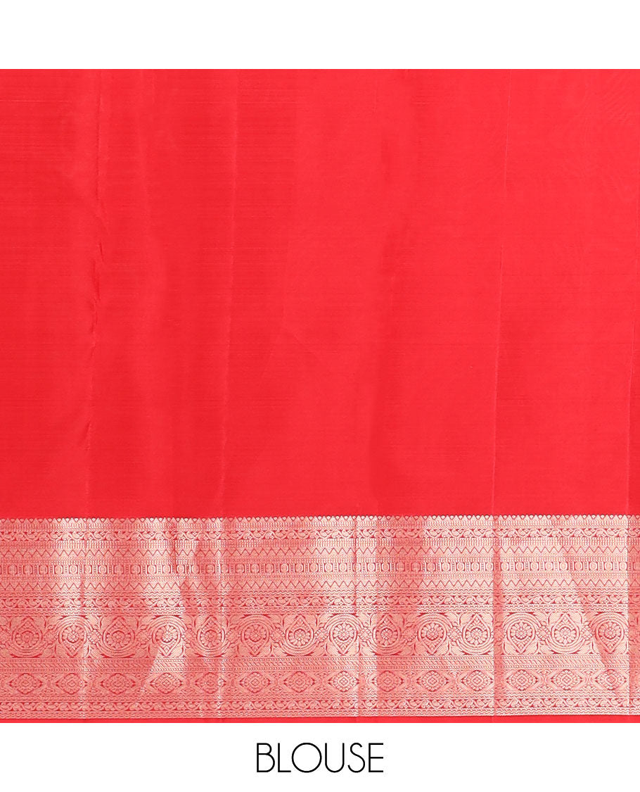 Orange iruthalai pakshi jacquard Kanchipuram wedding silk saree, zari traditional design border, and pallu of zari-rich jaal