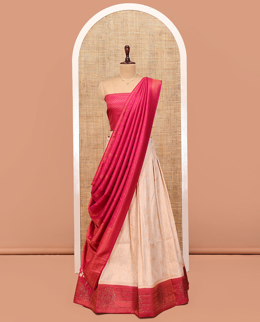 Cream Art Silk Half Saree, Subtly Sparkled with Jacquard Skirt, Contrast Traditional Stone-Work Border, a Jacquard Blouse, and Banaras Jacquard Dhavani