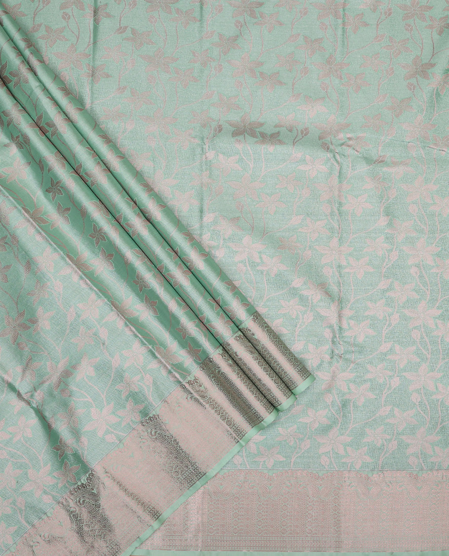 Green art silk pavadai set, floral jaal jacquard with traditional zari bordered skirt and a matching blouse