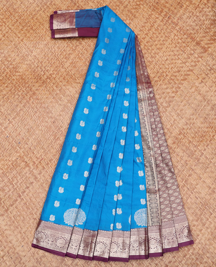 Blue Budget Silk Saree, Adorned with Peacock Buttas All Over Its Body, Complemented by a Contrast Border of Traditional Zari Designs, Grand Pallu of Jaal Designs, and Paired with a Contrast Blouse
