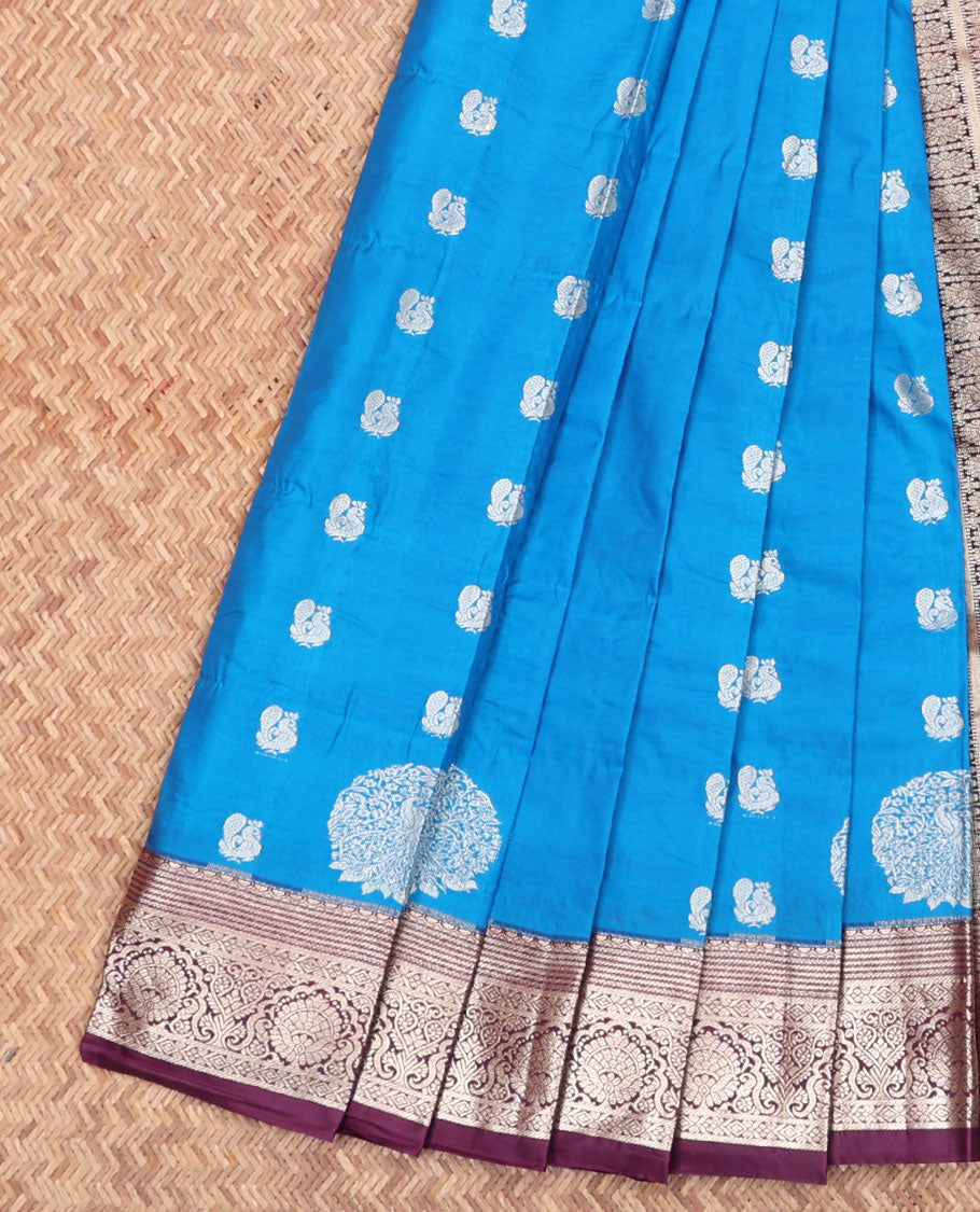 Blue Budget Silk Saree, Adorned with Peacock Buttas All Over Its Body, Complemented by a Contrast Border of Traditional Zari Designs, Grand Pallu of Jaal Designs, and Paired with a Contrast Blouse