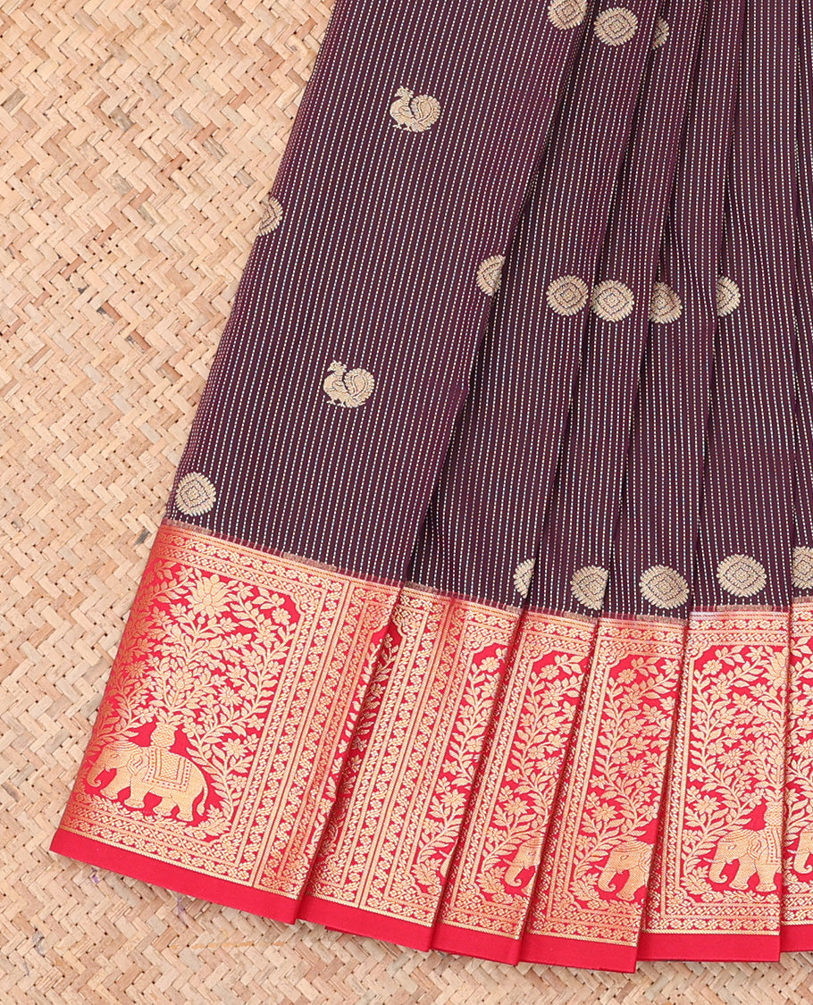 Maroon Budget Silk Saree, Adorned with Peacock-Chakram Buttas and Stripes, a Contrast Elephant Border, Paisleys Pallu, and a Contrast Blouse