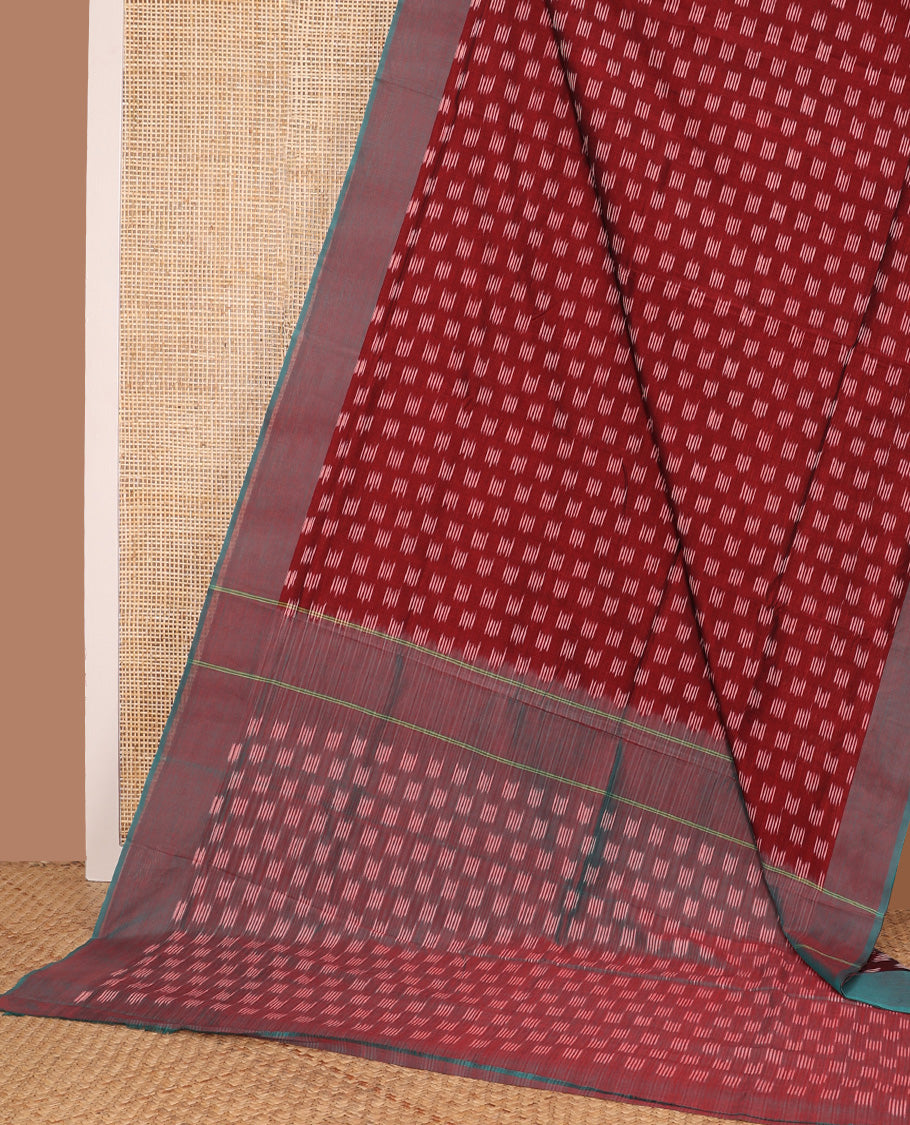 Maroon unique buttas woven ikkat cotton saree, contrast plain border, and pallu of buttas