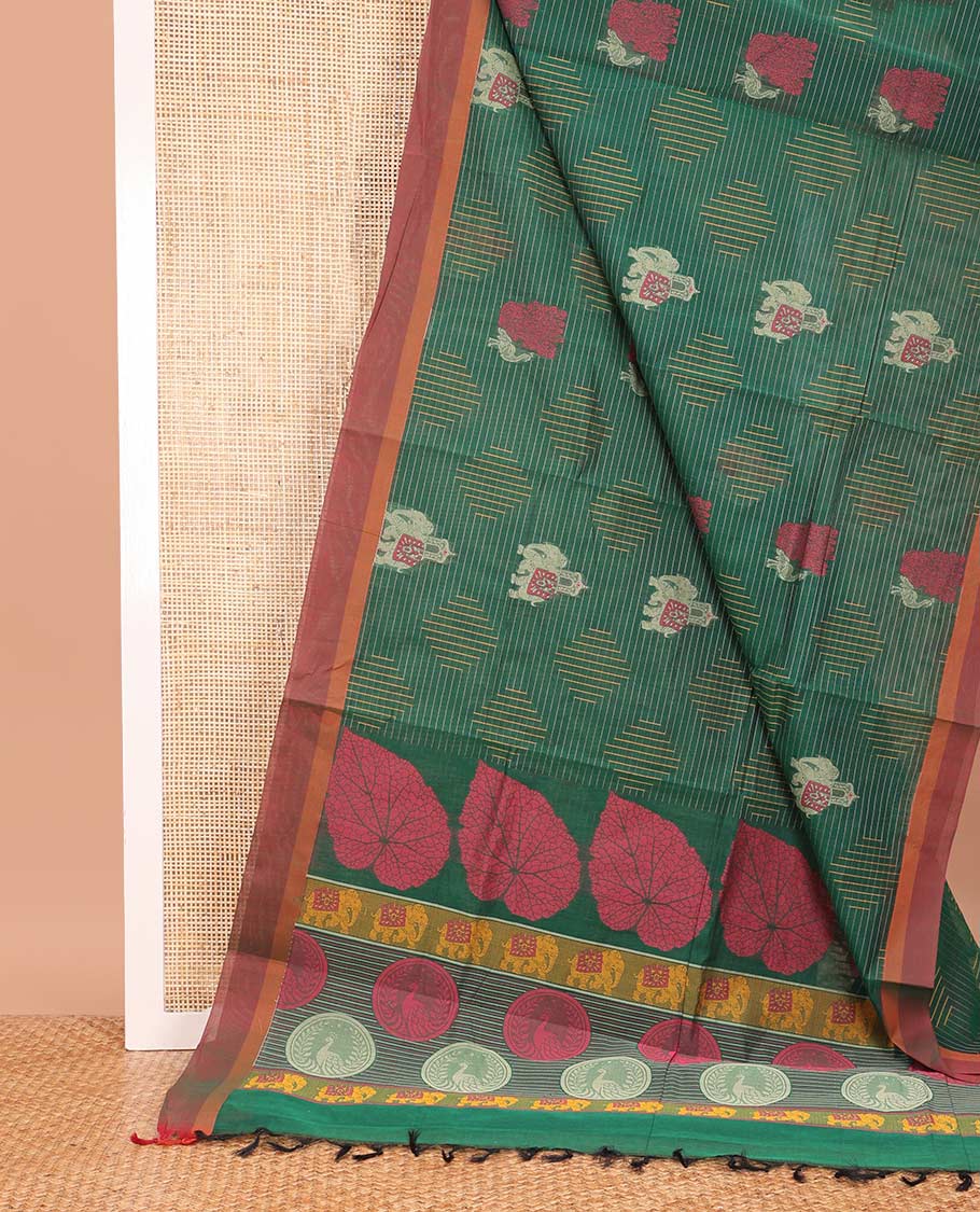 Green elephant motifs and geometric-patterned Coimbatore cotton saree, contrast border, and pallu of leaf and animal motifs print