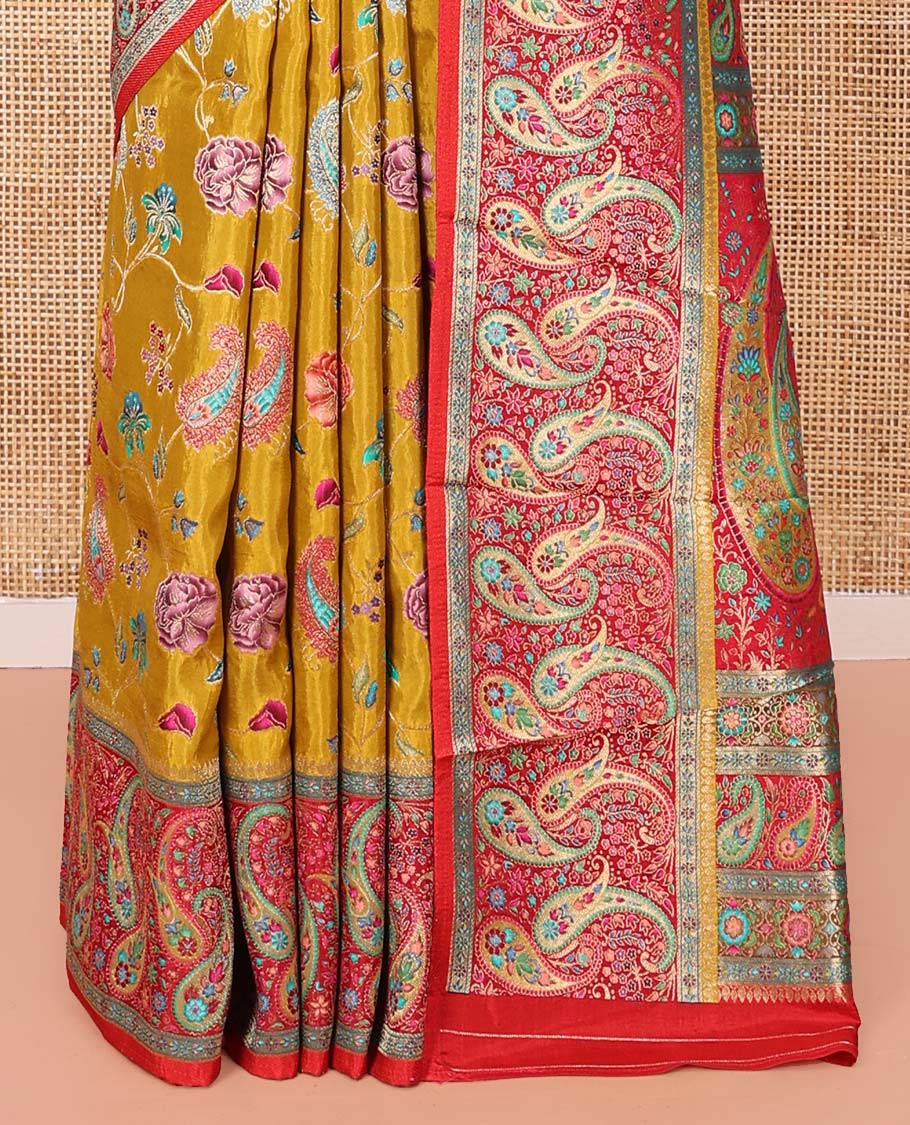 Mustard Dola Silk Saree, Elegantly Printed with Colorful Floral-Paisley Vine Design on Its Body, Complemented by Contrast Paisley Design Border, Pallu of Paisleys, and Paired with a Contrast Blouse