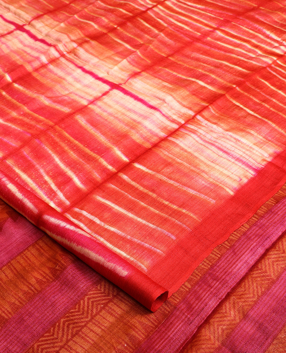 Multi-color shibori printed tussar silk saree, plain border, and pallu of temple, and chevron designs