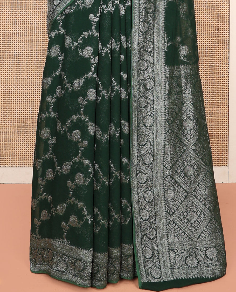 Green Georgette Saree, Adorned with Floral Jaal Jacquard, Highlighted by Floral Creeper Border, Grand Jaal Pallu, and a Matching Blouse