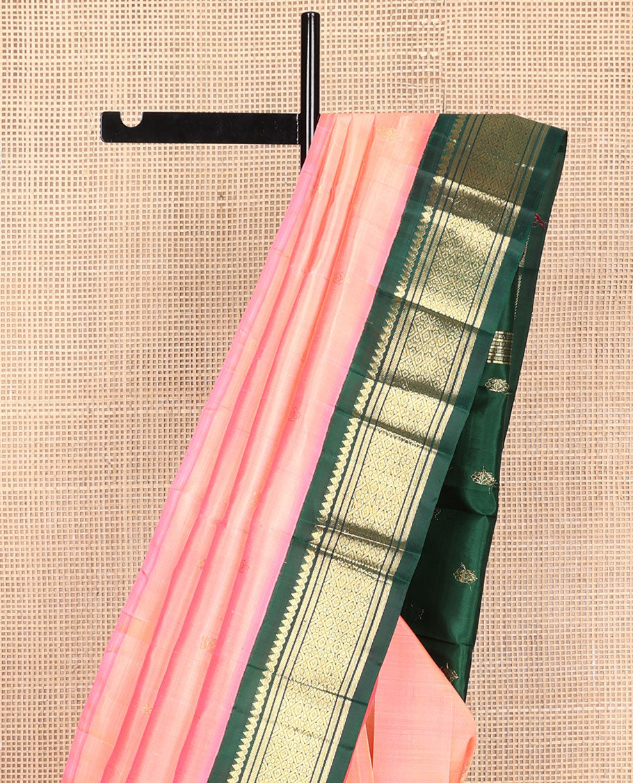 Peach zari buttas Kanchipuram silk saree, contrast korvai one-sided border of thilakam mokku, banaras, and jaal designs, and zari design pallu