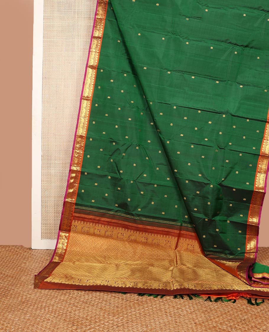 Green mayil buttas silk saree, contrast border of thazampoo rekku,banaras,muthu,mayil & yaanai & pallu of rudraksham designs