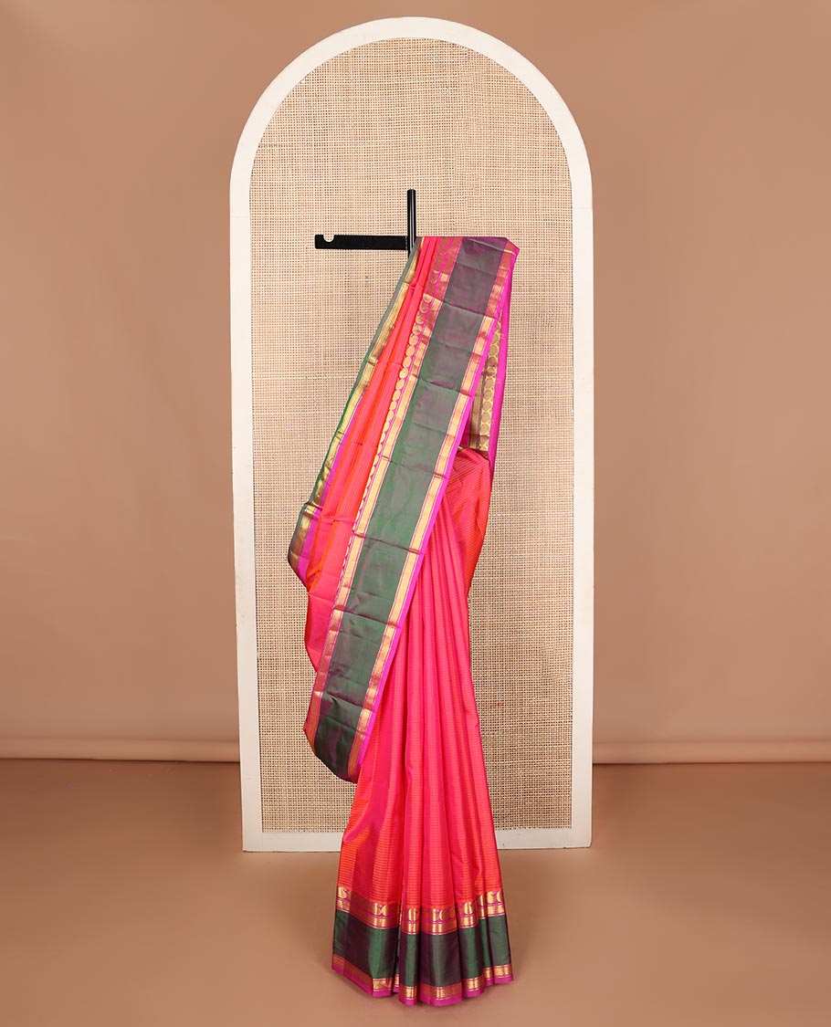 Pink striped Kanchipuram silk saree, contrast ganga jamuna rettai pettu border of manga, banaras, and mayil kann designs, and zari striped pallu
