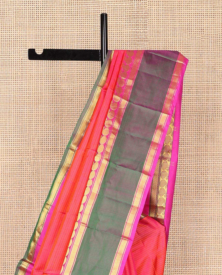 Pink striped Kanchipuram silk saree, contrast ganga jamuna rettai pettu border of manga, banaras, and mayil kann designs, and zari striped pallu